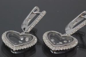 aLEm Earring with leverback 925/- silver, approx sizes H 31,0mm, B 15,5mm rhodium plated with Zirconia heart,  in the center moving Zirconia between two glasses and security leverback